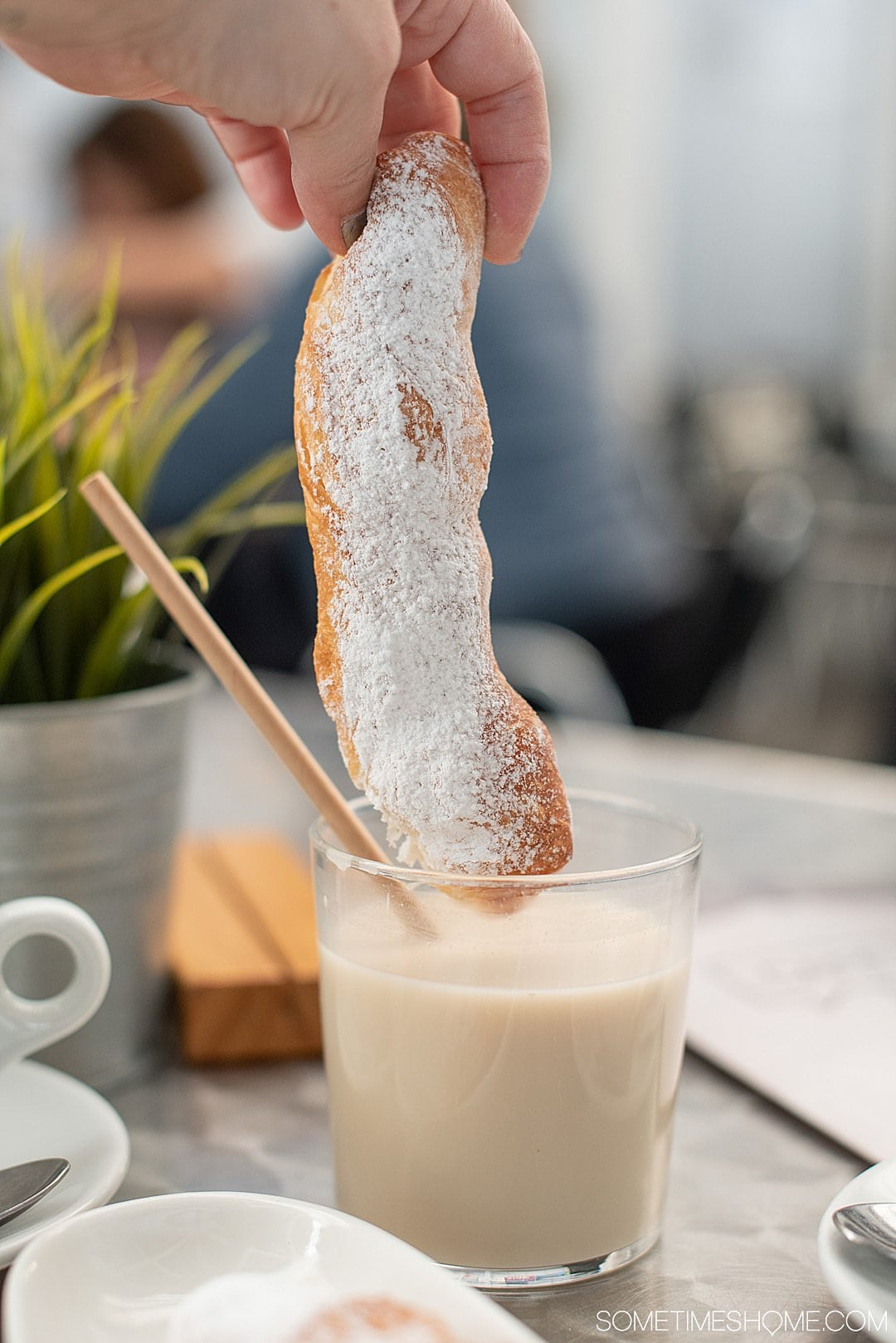 Glass of horchata, a typical Valencian drink, and pastry.