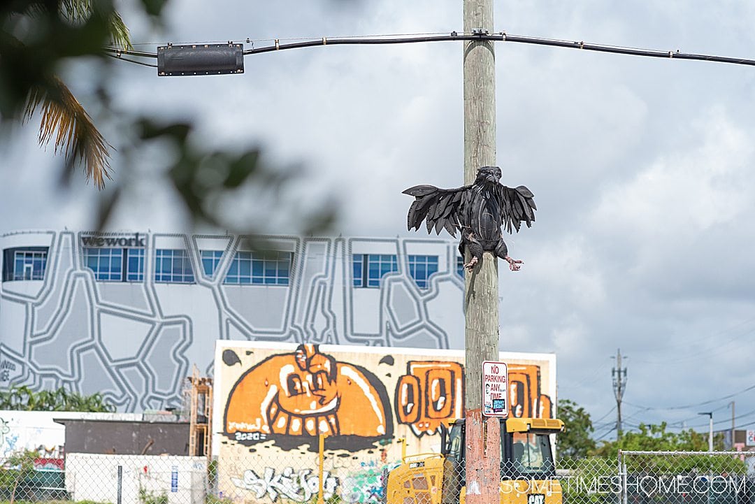 Fun things to do in Wynwood like find sculptures, on Sometimes Home travel blog. Click through for all the information on this popular neighborhood in Miami, Florida.