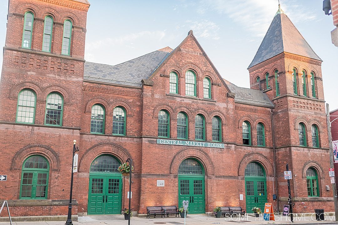 Brick building with green doors and windows in downtown York, PA