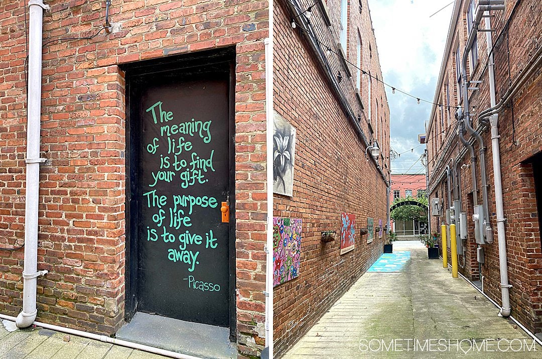 Door with a Picasso quote and art alley