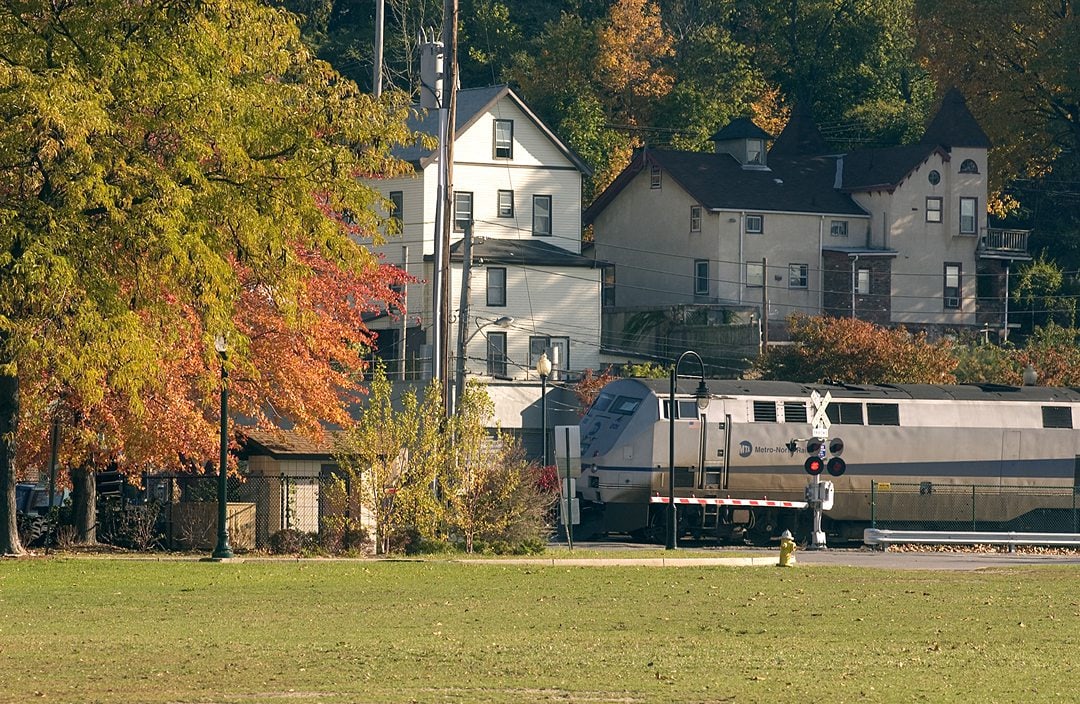 A train and autumn colors.