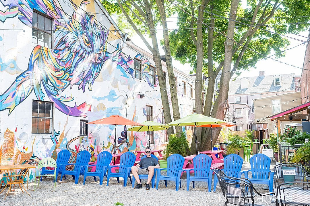 Owl mural painting in a colorful courtyard