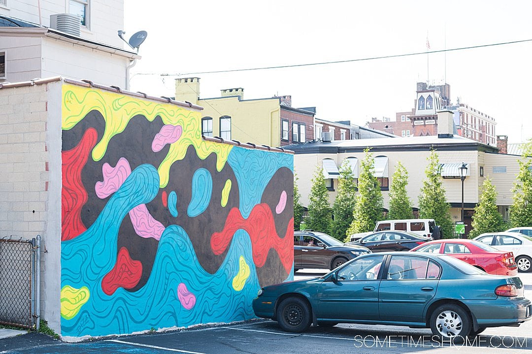 Blue, pink, red, green and black mural in York, PA