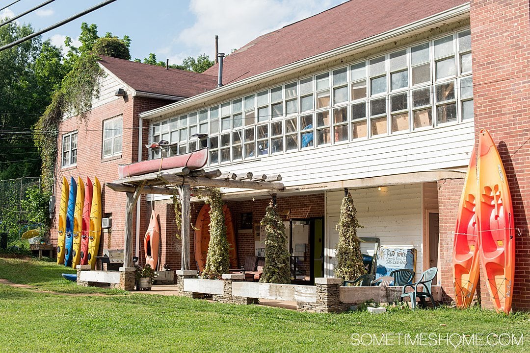 Kayaks against a building in NC