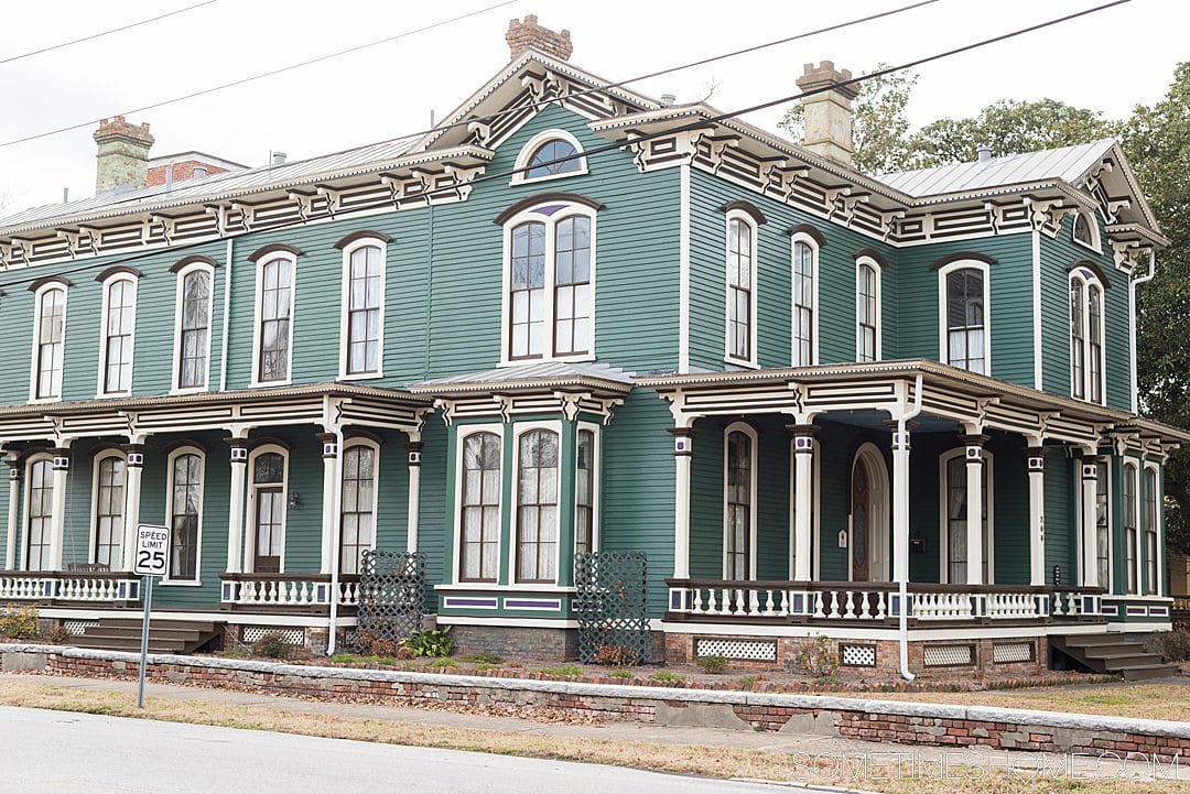 Victorian style home painted green, white and black in Goldsboro, NC