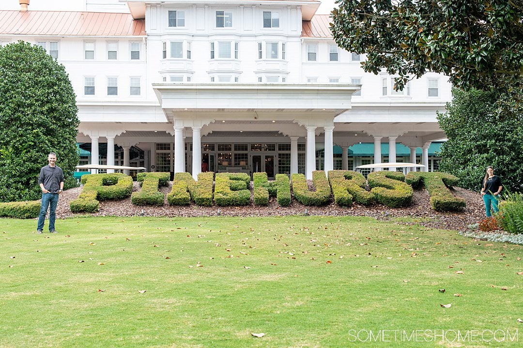 Hotel with "PINEHURST" boxwood plants out front in Pinehurst, NC.