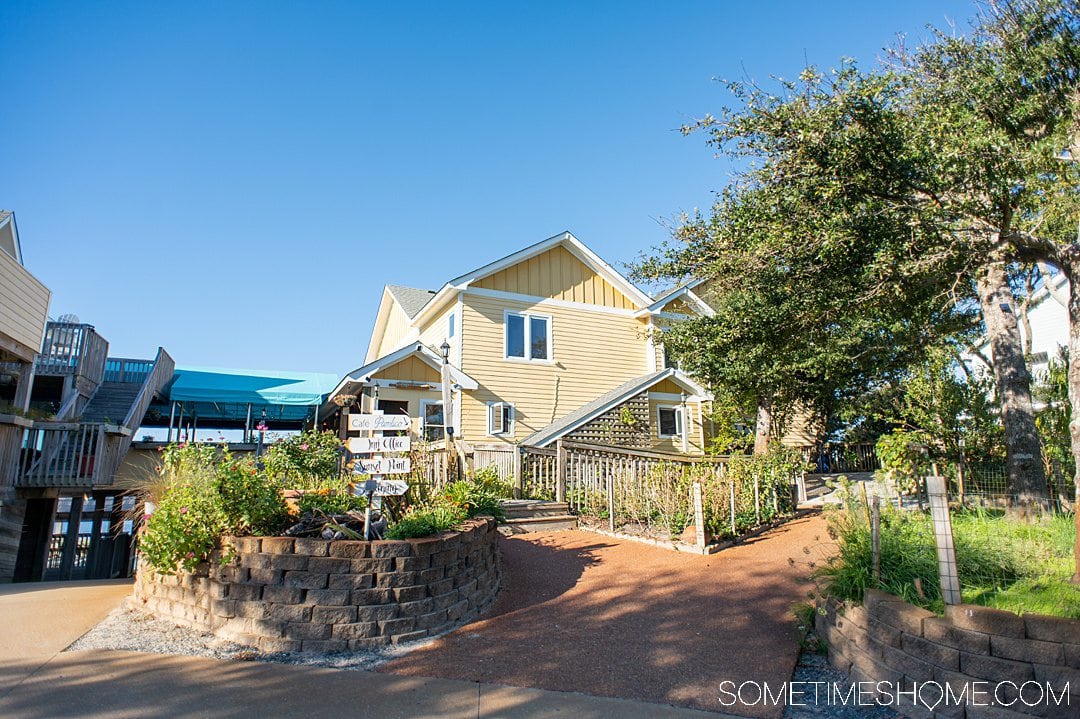 Blue skies above a yellow painted building at the Inn on Pamlico Sound in Buxton, in the Outer Banks of NC.