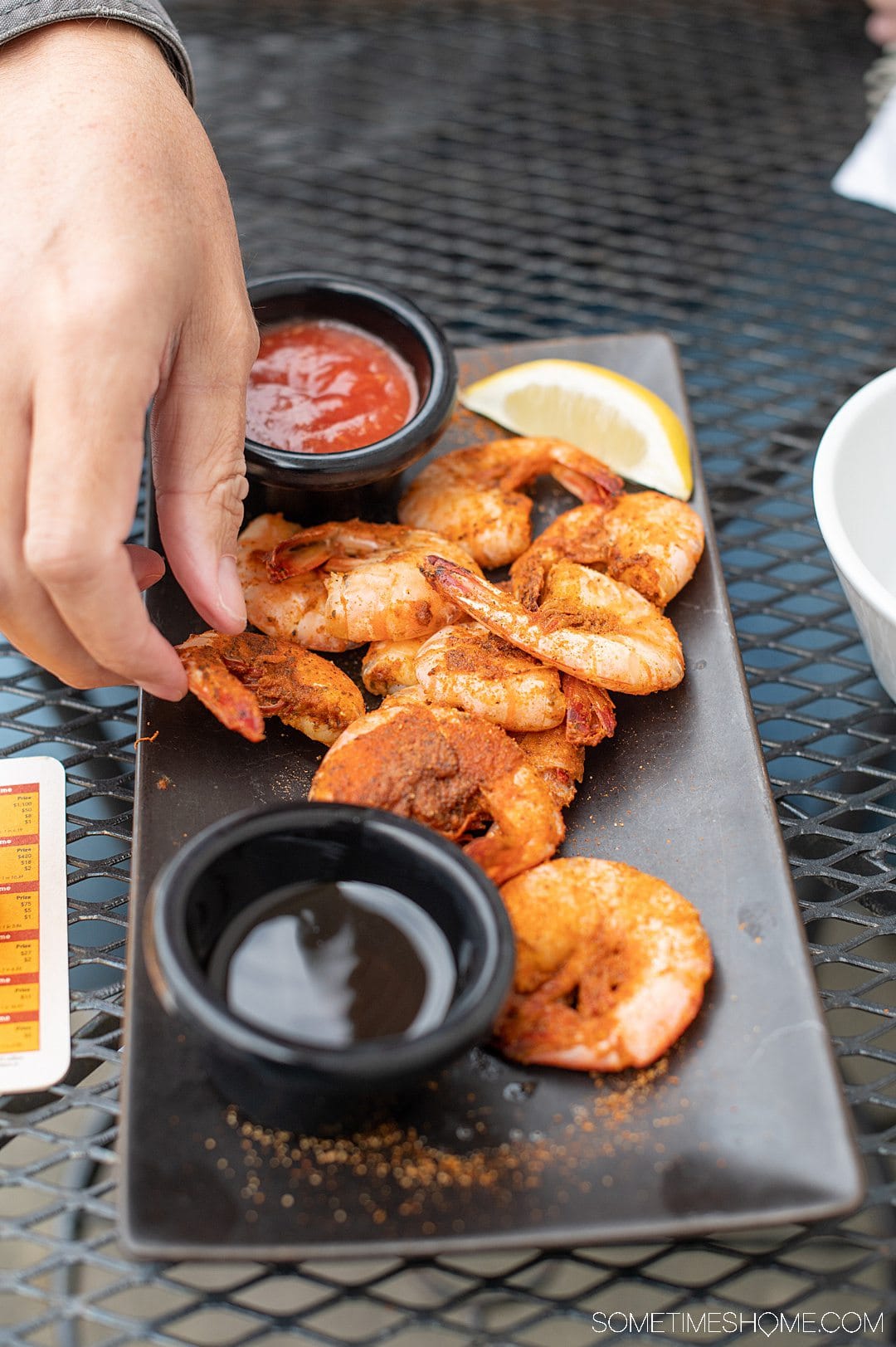 Steamed peel and eat shrimp with seasoning on it, at Avenue Waterfront Grill, one of the best seafood restaurants in the Outer Banks.