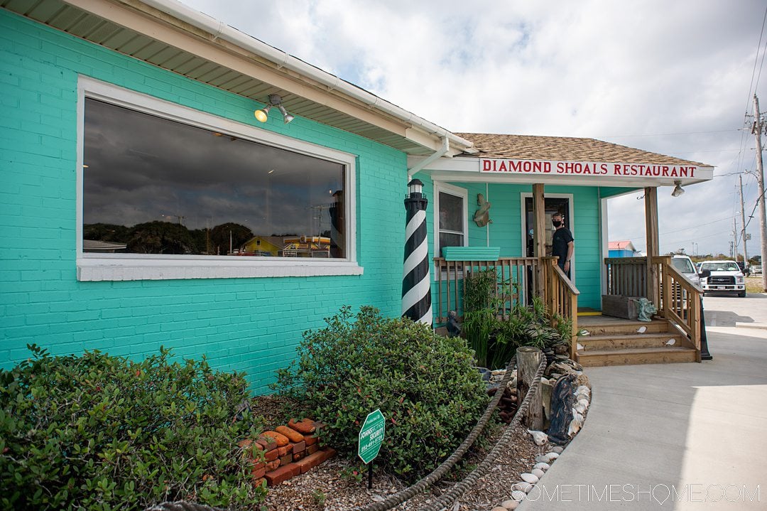 Blue facade of a restaurant in Hatteras, called Diamond Shoals.