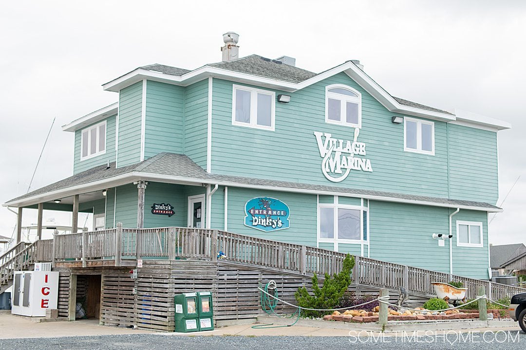 Exterior of the Village Marina building where Dinky's restaurant is in the Outer Banks.