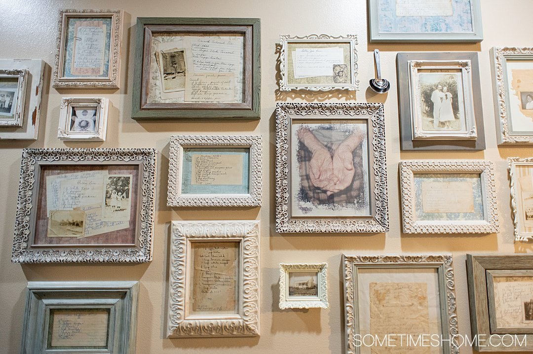 A wall of framed old photographs and hand written recipes at Fayetteville Pie Company in North Carolina.