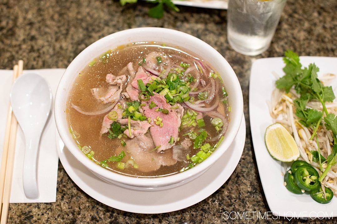 Bowl of rare beef pho in Fayetteville, NC restaurant Grilled Ginger.