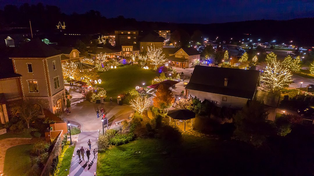 Exterior of The Biltmore village in Asheville, NC, decorated with Christmas lights.