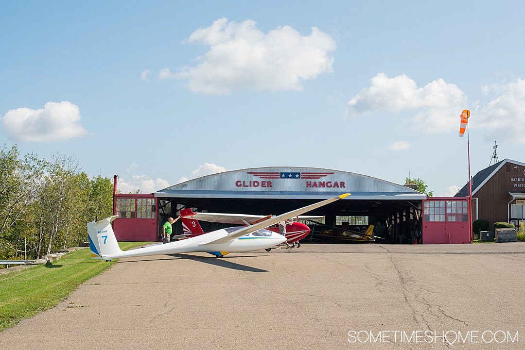 White hang glider in the Finger Lakes of New York.