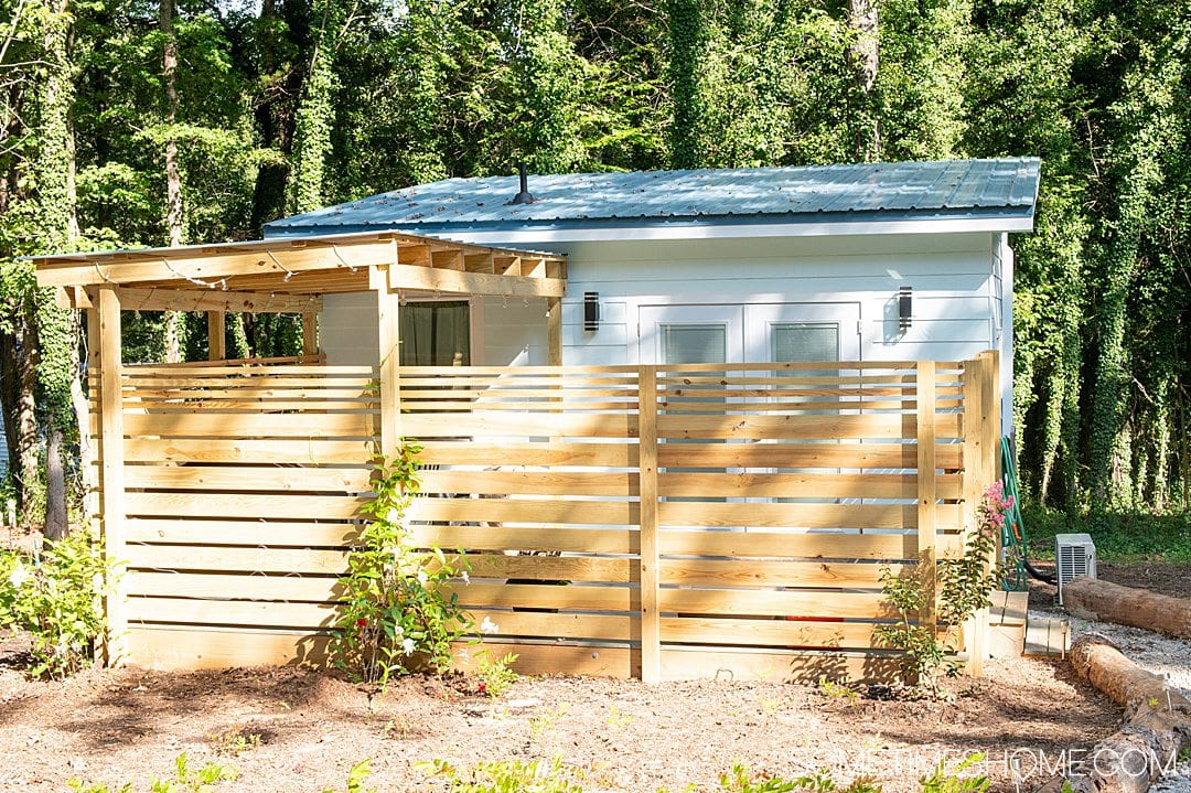 Places to stay in Warrenton, NC: Tiny Home Air BnB with a wooden fence out front.