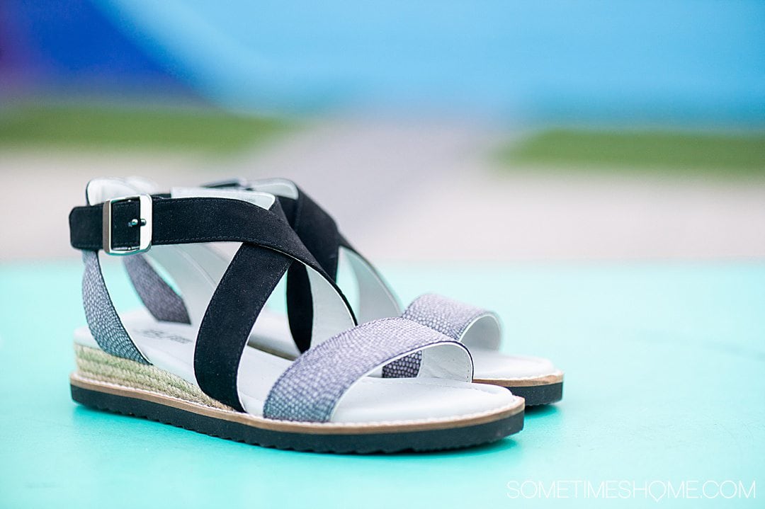 Black and grey decoration pair of Jambu shoes sandals for a review post.