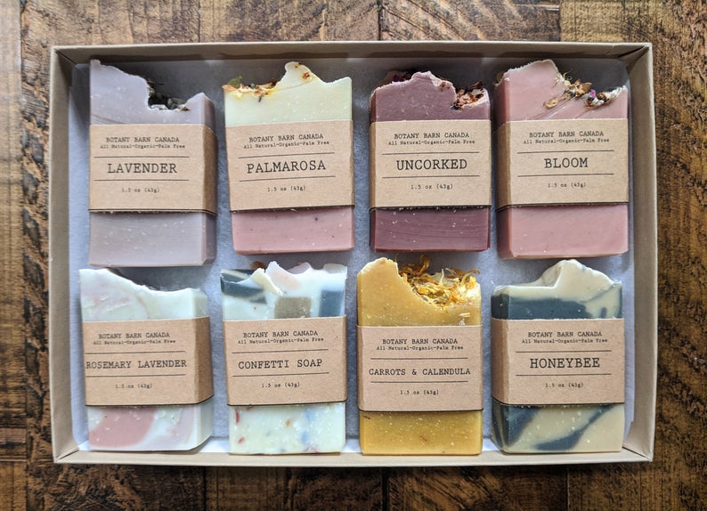 Set of 8 handmade soaps in Earth tone colors in a kraft color rectangular box for practical house warming gifts.