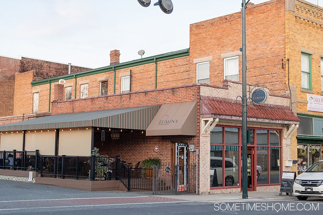 Facade and side of Lumina wine bar in downtown Asheboro, NC.