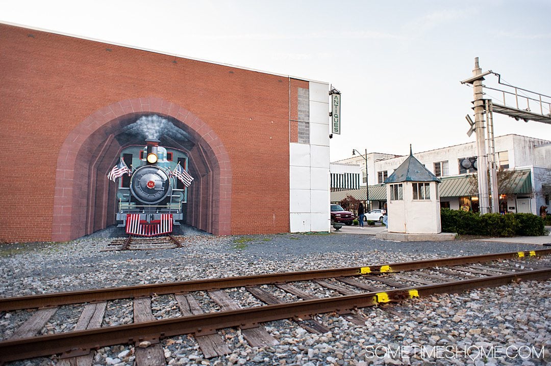 Train mural by train tracks in downtown Asheboro, NC.