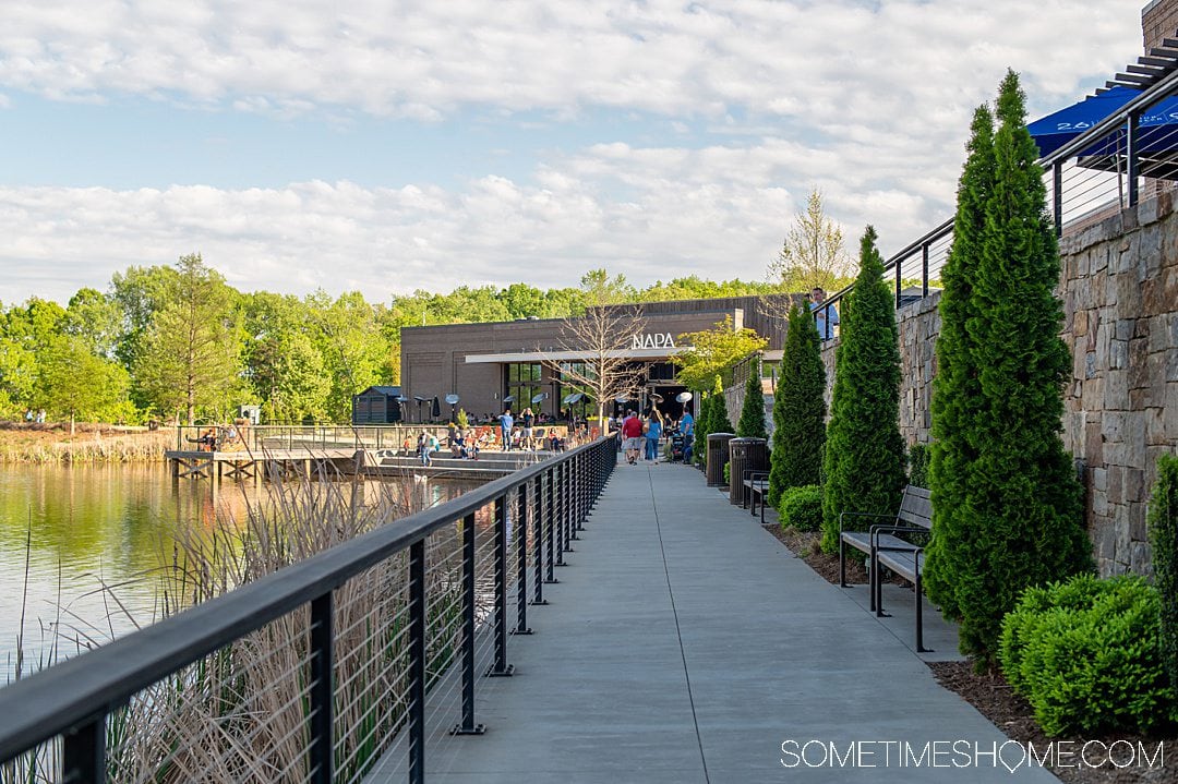 Boardwalk leading up to a restaurant in the distance at Kinglsey town center in Fort Mill, SC.