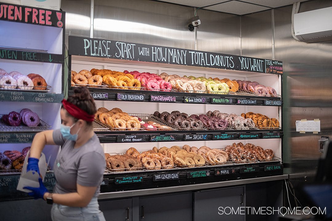 Shelves of donuts at Holy Donuts in Portland, Maine. Donuts are a food Maine is known for.