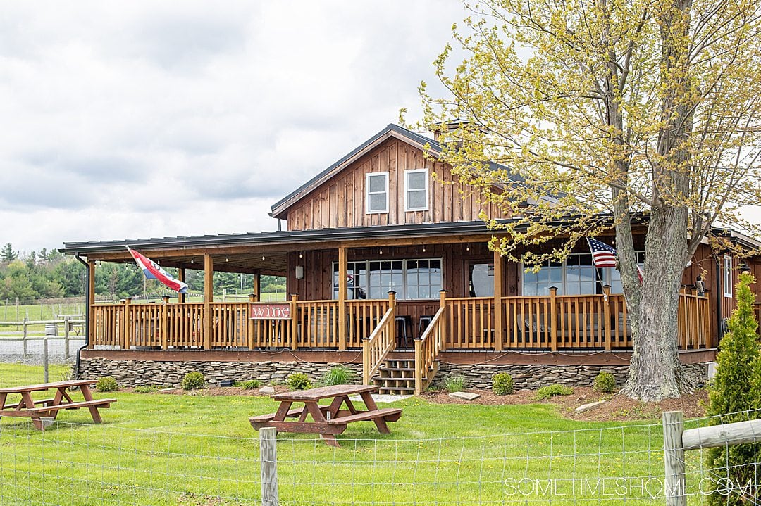 Wooden structure that is the tasting room of Point of the Bluff vineyards in Hammondsport, NY.