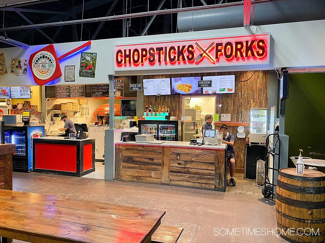 Chopsticks and Forks Asian cuisine option inside Morgan Street Food Hall in Raleigh, NC.