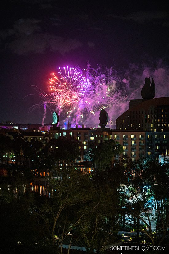 View of the fireworks at night at the Swan Reserve from an Epcot view suite at Disney World.