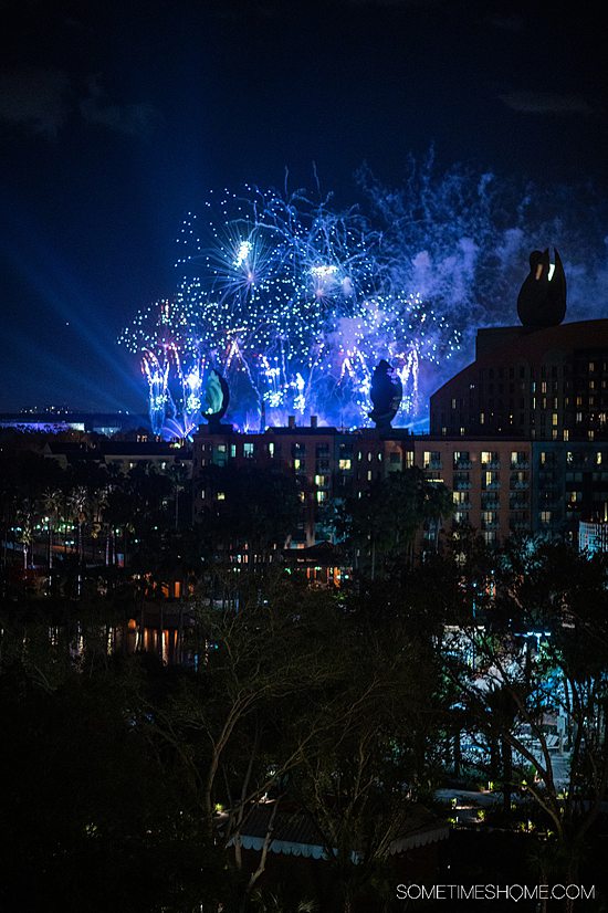 View of the fireworks at night at the Swan Reserve from an Epcot view suite at Disney World.