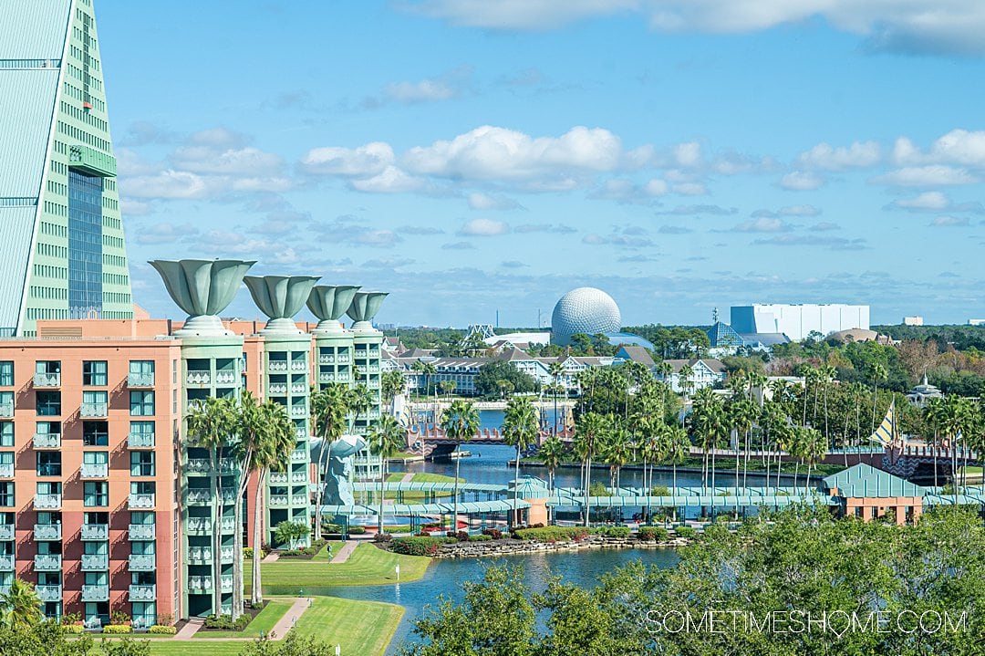 View of Epcot from a suite at the Swan Reserve hotel, with blue skies and white clouds overhead.
