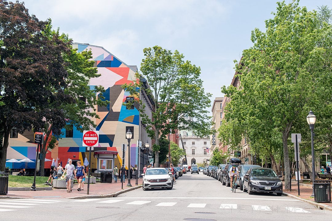 Street view in Portland, with a colorful mural during a Maine coast road trip through the state.