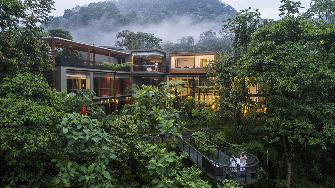 Ecuador eco-lodge Masphi Lodge with clouds and lots of jungle foliage