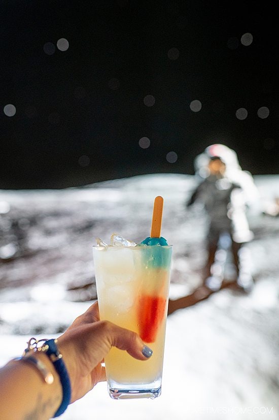 Red, white and blue Rocket Pop in a pint glass with a margarita.