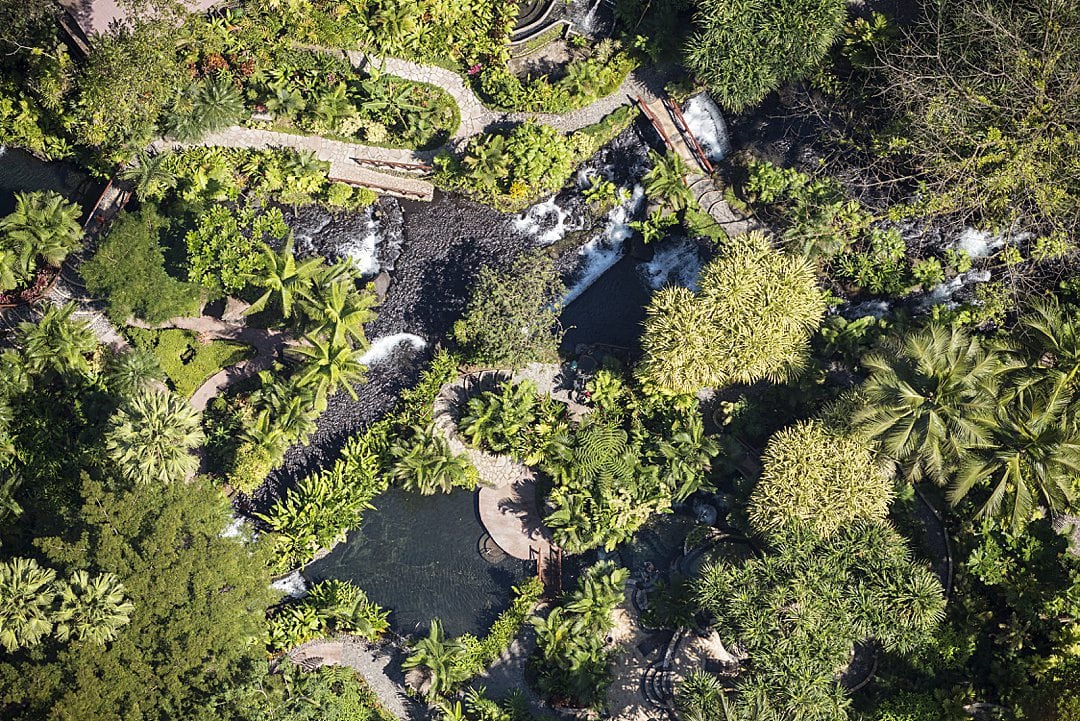 Aerial view of Tabacon Resort and Spa's hot springs that day pass and hotel guests can enjoy.