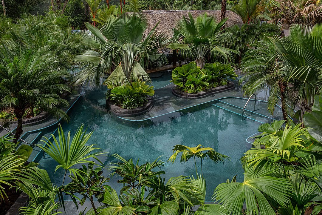 View of the main pool from an elevated perspective at Tabacon Resort & Spa.