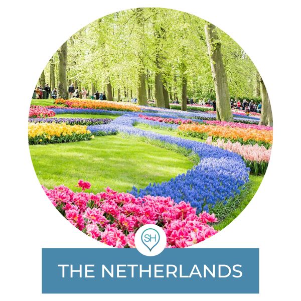 The Netherlands category post on Sometimes Home travel blog with a picture of Keukenhof tulip gardens.