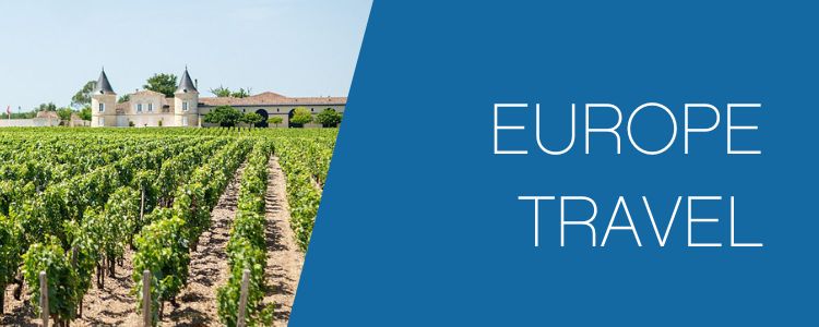 Europe travel category on a couples travel website, Sometimes Home, with a photo of a green vineyard and chateau in the distance.