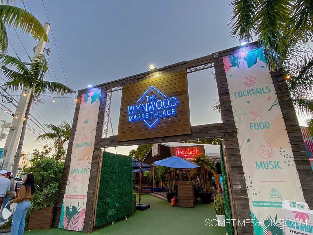 Wynwood Marketplace entrance with a blue neon sign.