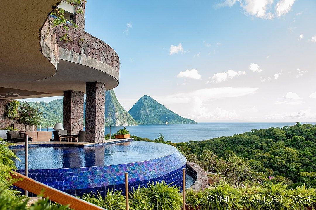 Jade Mountain galaxy suite without a fourth wall, looking over the hot tub to the Piton mountains in the distance.