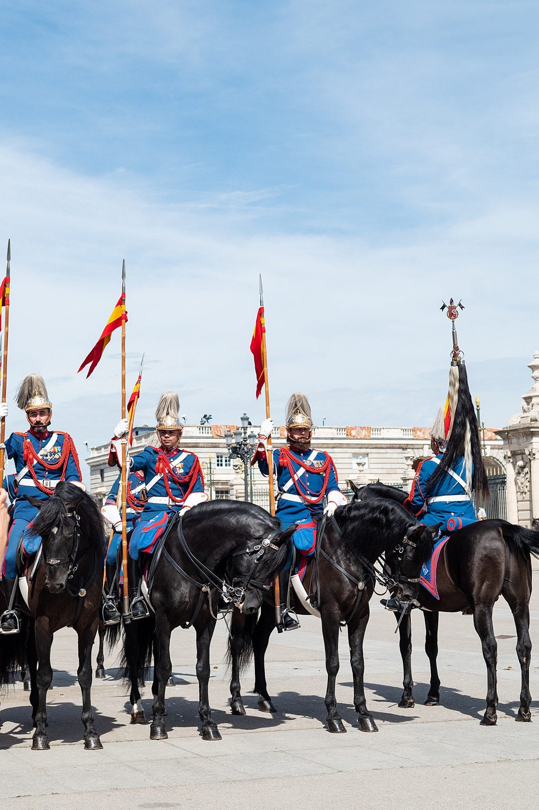 Royal Guard on horseback in front of the Royal Palace of Madrid during an official ceremony. 