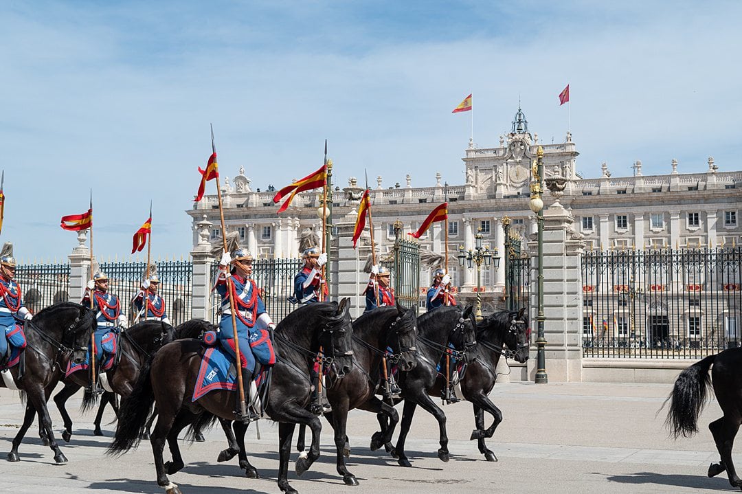 Royal Guard on horseback in front of the Royal Palace of Madrid during an official ceremony. 
