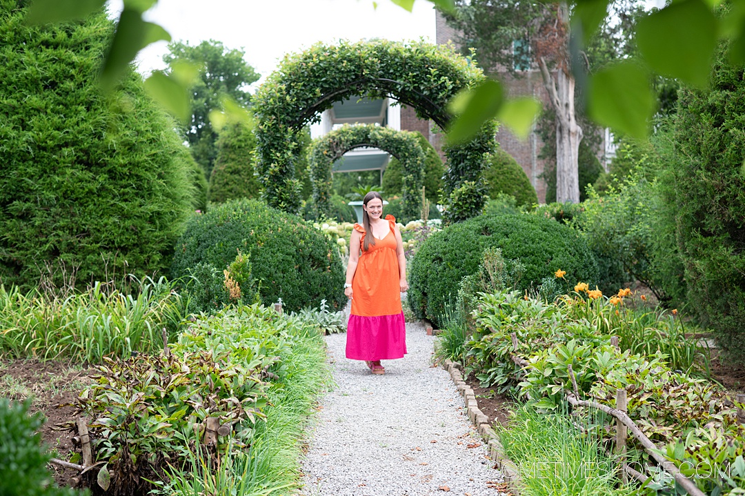 Woman in a manicured green garden in Franklin, TN