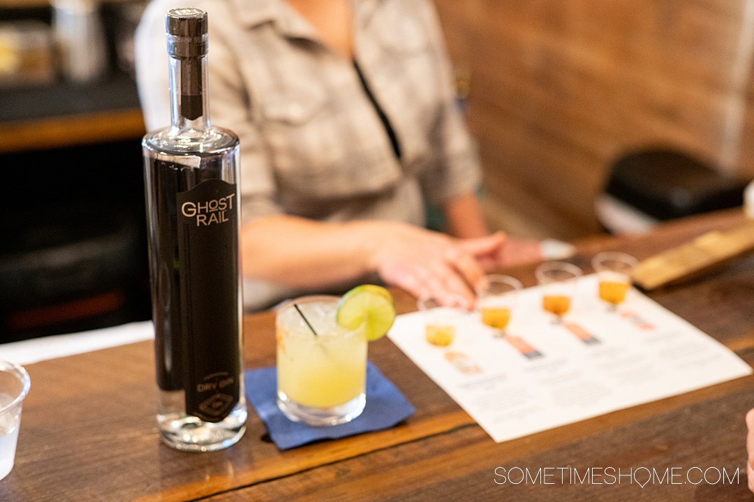 A bottle of liquor, a cocktail, and small tastings at a distillery in Tennessee.