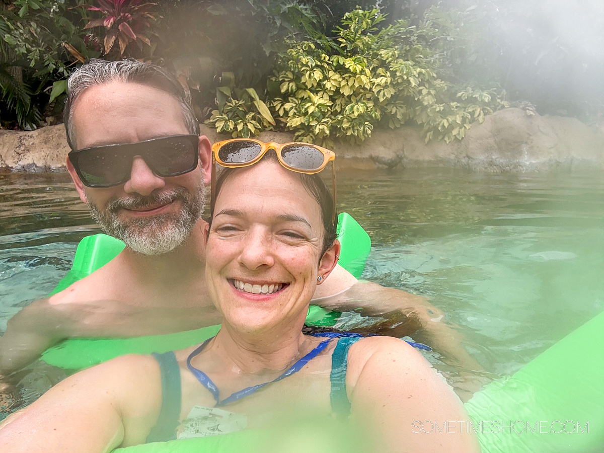 Couple in the water at Discovery Cove park in the lazy river.