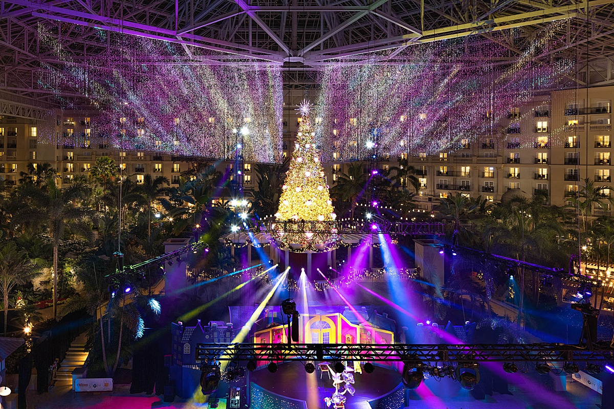 Christmas tree in the atrium of Gaylord Palms Resort with lights surrounding it.