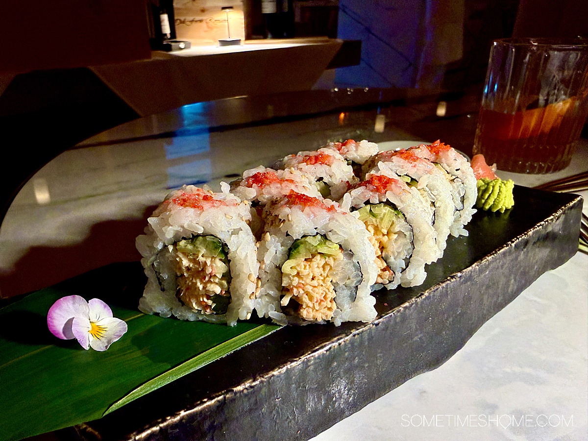 Sushi maki roll on banana leaf.