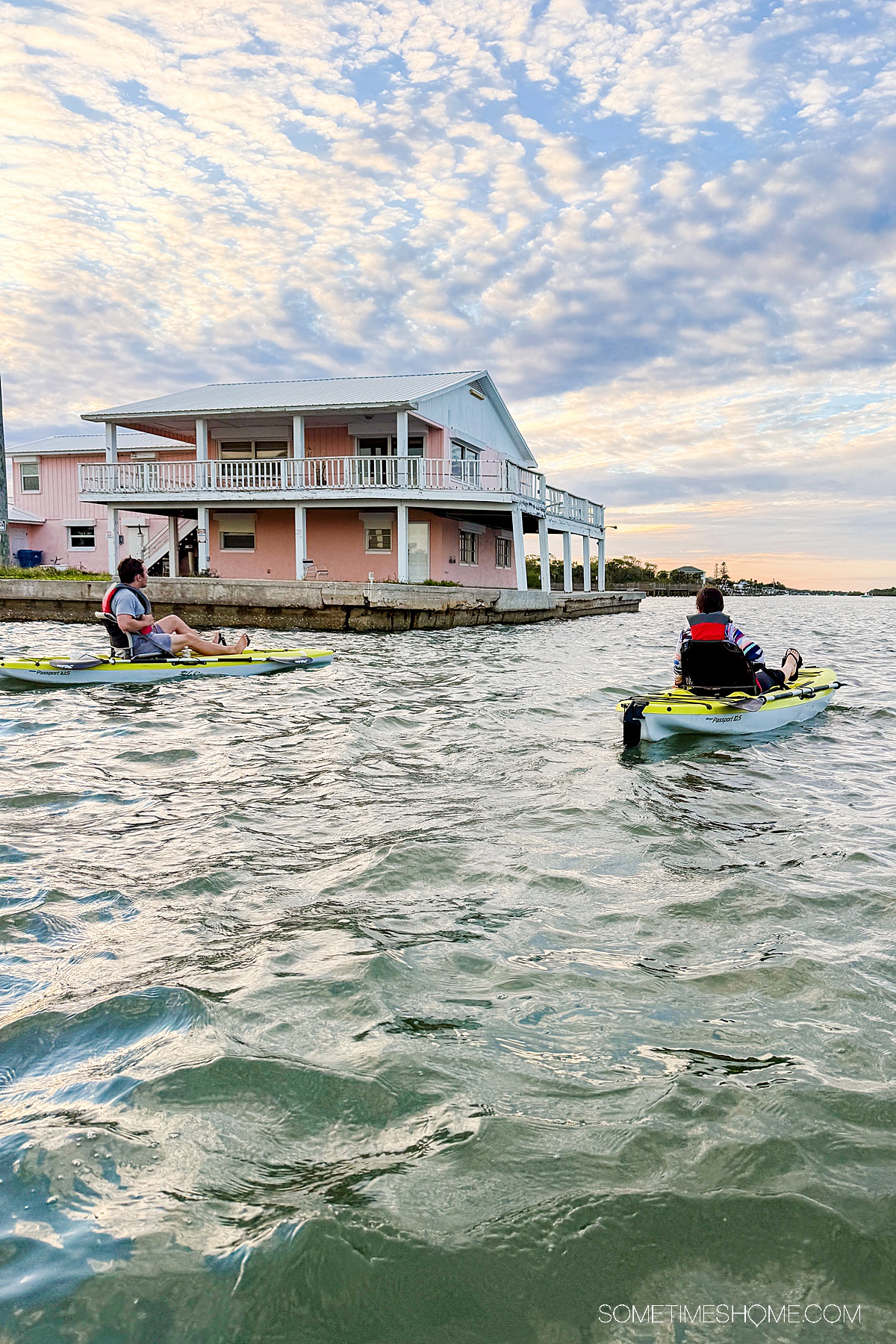 Two kayaks in the Indian River Lagoon during sunset.